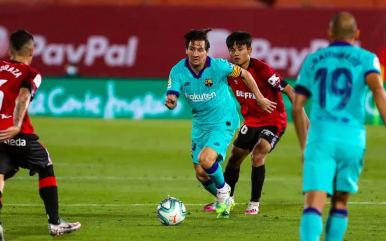 Messi scores 20 goals for the 12th consecutive season as Barcelona thrashes Mallorca by 4-0