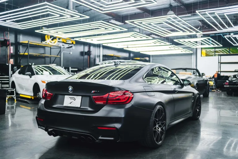 black car parked in modern garage