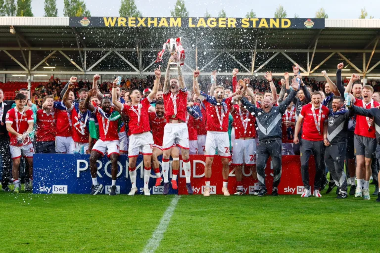 Wrexham’s Historic Promotion: Hollywood Owners Ryan Reynolds and Rob McElhenney Lead the Welsh Club to Championship