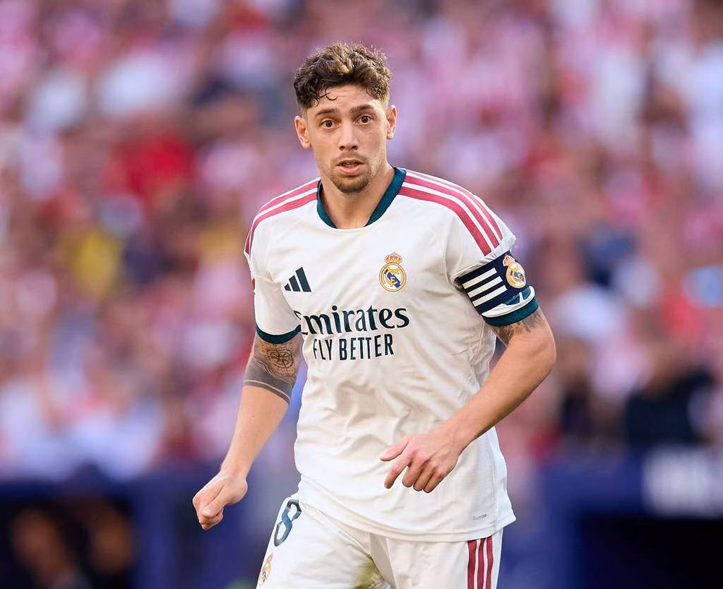 Federico Valverde carries the ball for Real Madrid during a LaLiga match in Madrid